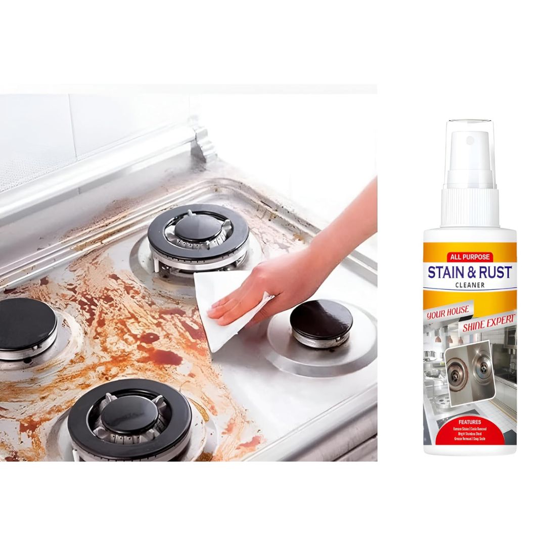 Wiping rust and grime off a gas stove burner with Stain and Rust Cleaner Spray